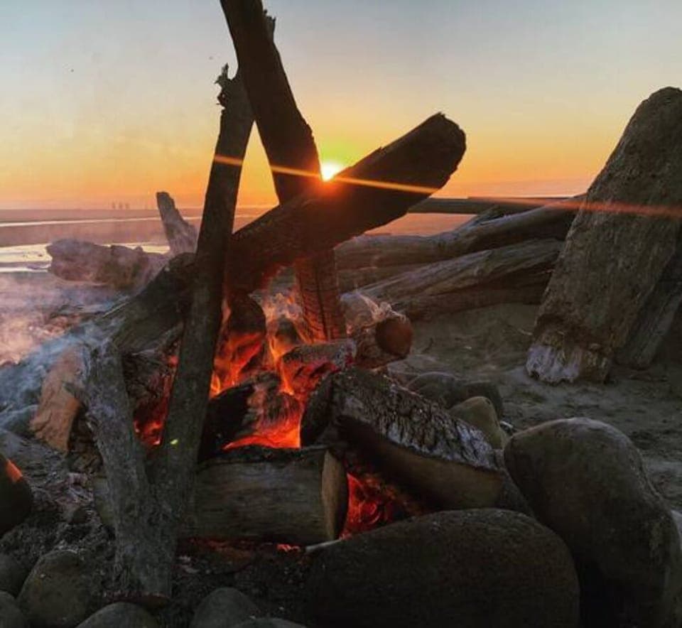 Enjoying a beach bonfire on Holiday Beach