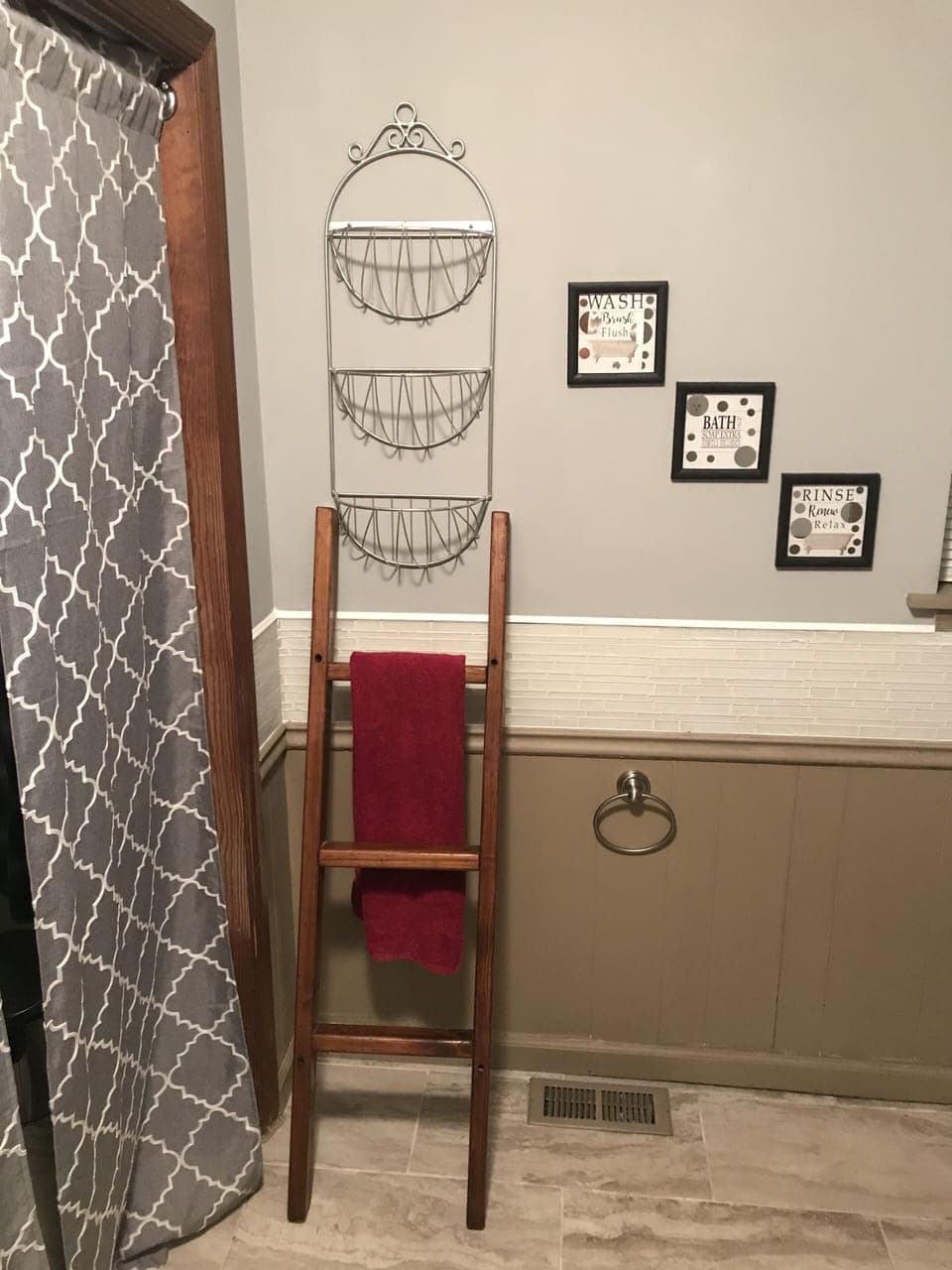 Snazzy comfy bath with large closet and a ladder towel rack