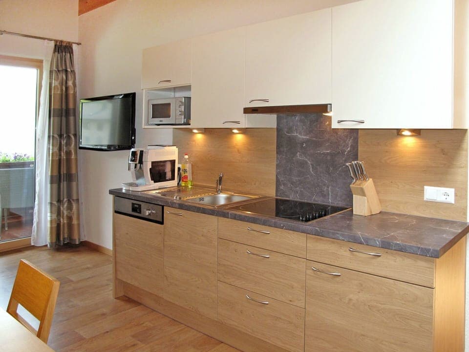 Cabinetry, Countertop, Kitchen Stove, Kitchen Appliance, Kitchen, Drawer, Wood, Interior Design, Stove, Building