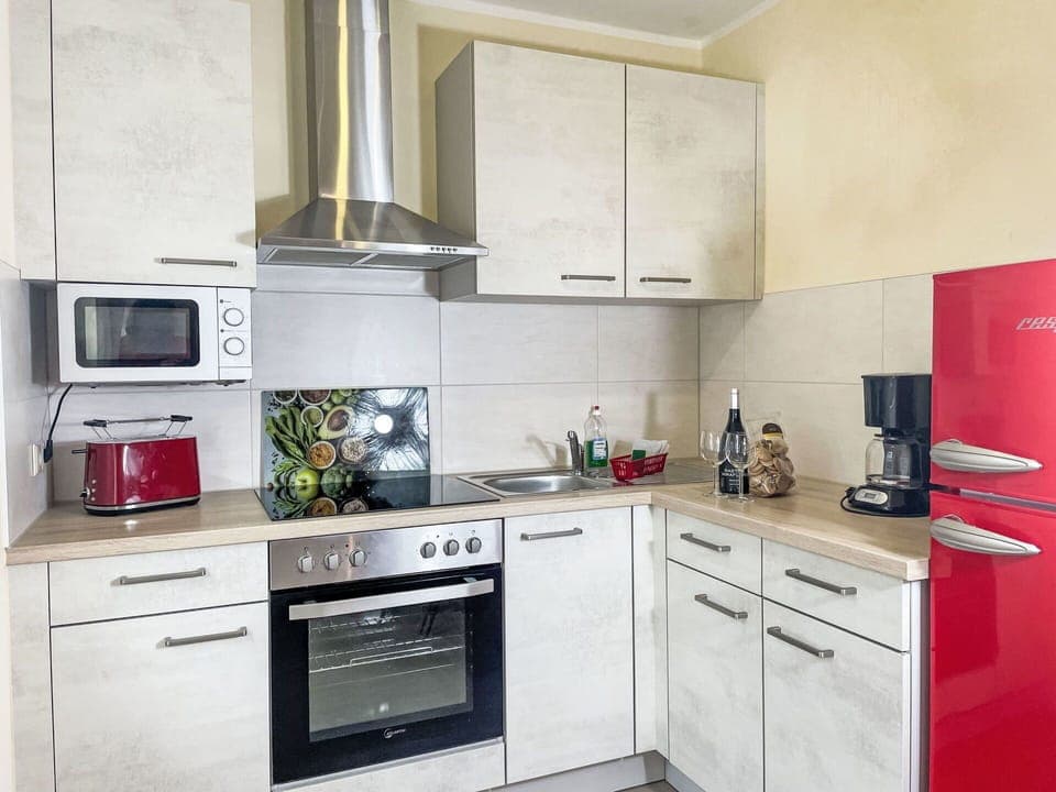 Countertop, Cabinetry, Building, Property, Furniture, Kitchen Appliance, Kitchen Stove, Kitchen, Home Appliance, Sink