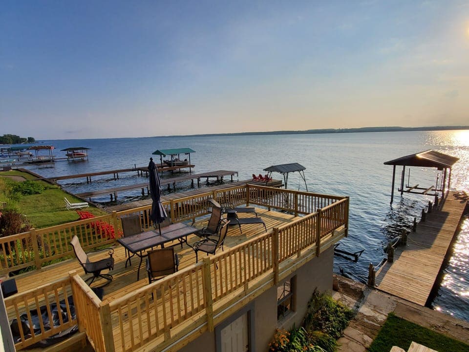 Brand new beautiful upperboat house deck with grill and lots of seating 