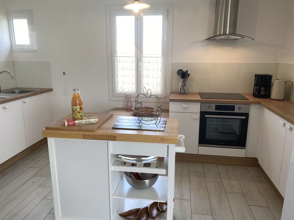 Kitchen, Countertop, Kitchen Appliance, Furniture, Flooring, Cabinetry, Interior Design, Major Appliance, Wood, Home Appliance