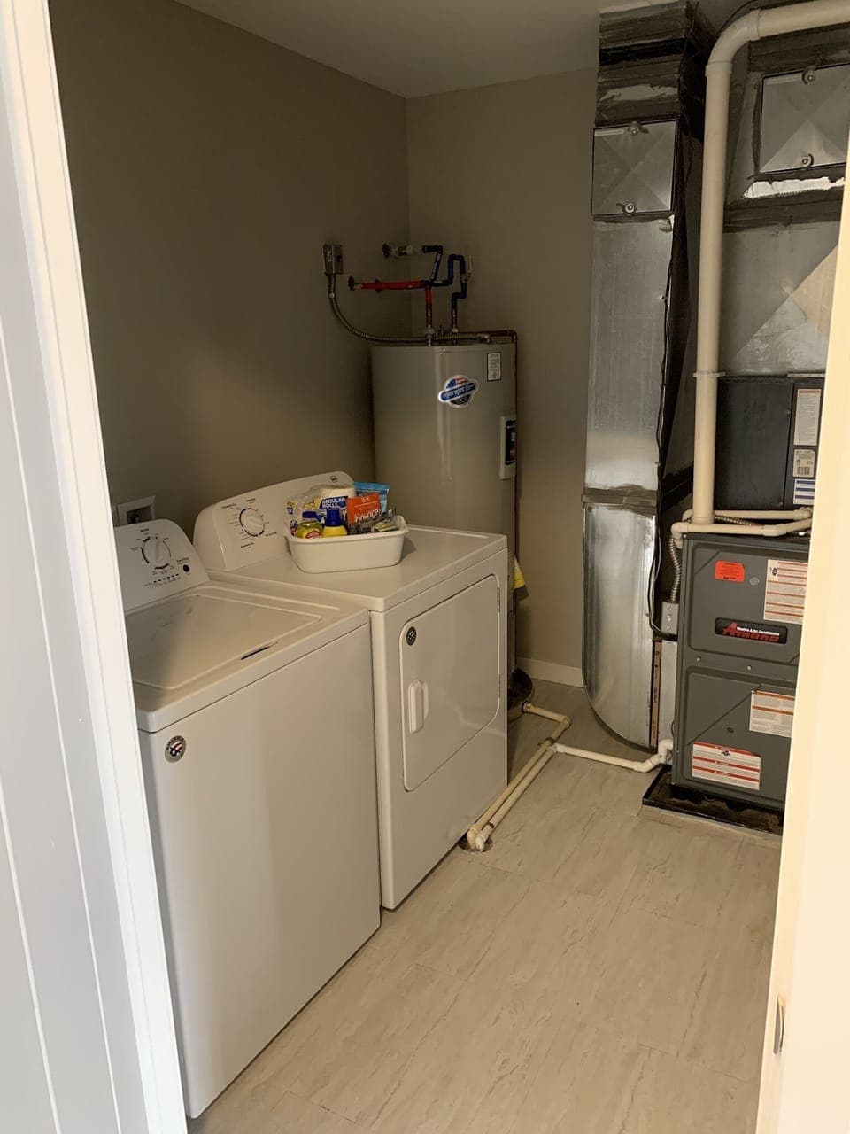 Laundry Room w/ Full size Washer and Dryer