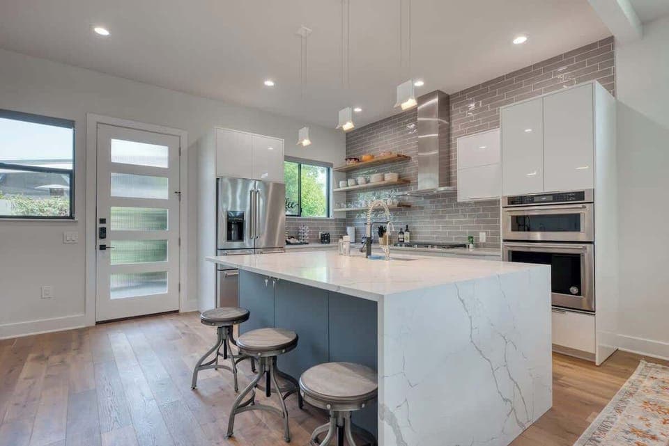 Open Airy Gourmet Kitchen with Island seating