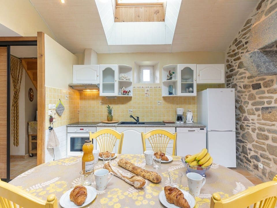 Food, Countertop, Cabinetry, Property, Furniture, Table, Tableware, Kitchen, Lighting, Interior Design