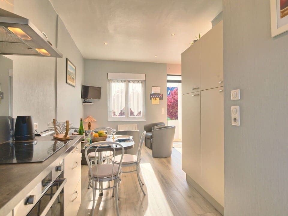 Countertop, Cabinetry, Kitchen Appliance, Kitchen, Home Appliance, Floor, Flooring, Building, Kitchen Stove