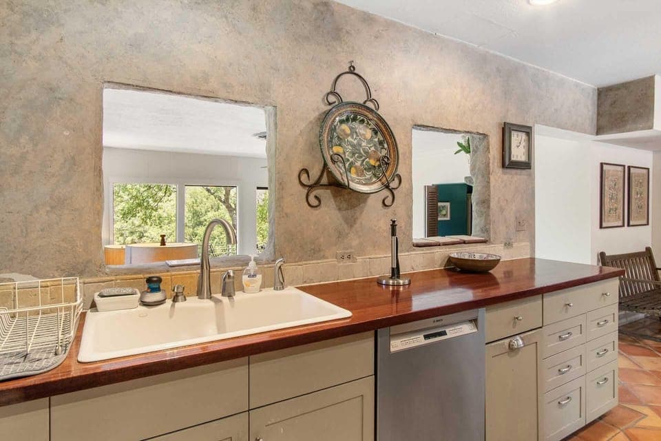 A great big partitioned sink and plenty of counter space assure no one is crowded during meal prep!