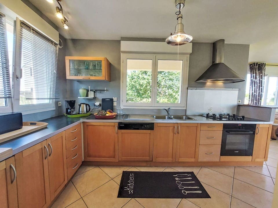 Kitchen, Kitchen Appliance, Countertop, Major Appliance, Cabinetry, Furniture, Interior Design, Home Appliance, Kitchen Stove, Kitchen Sink