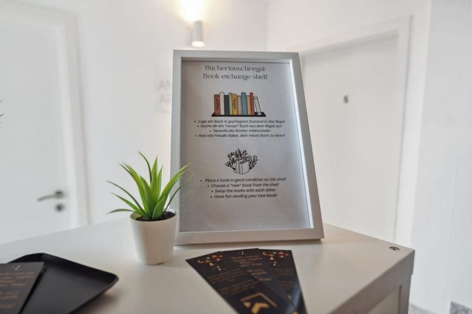 Book exchange shelf with lots of books, free bookmarks and games