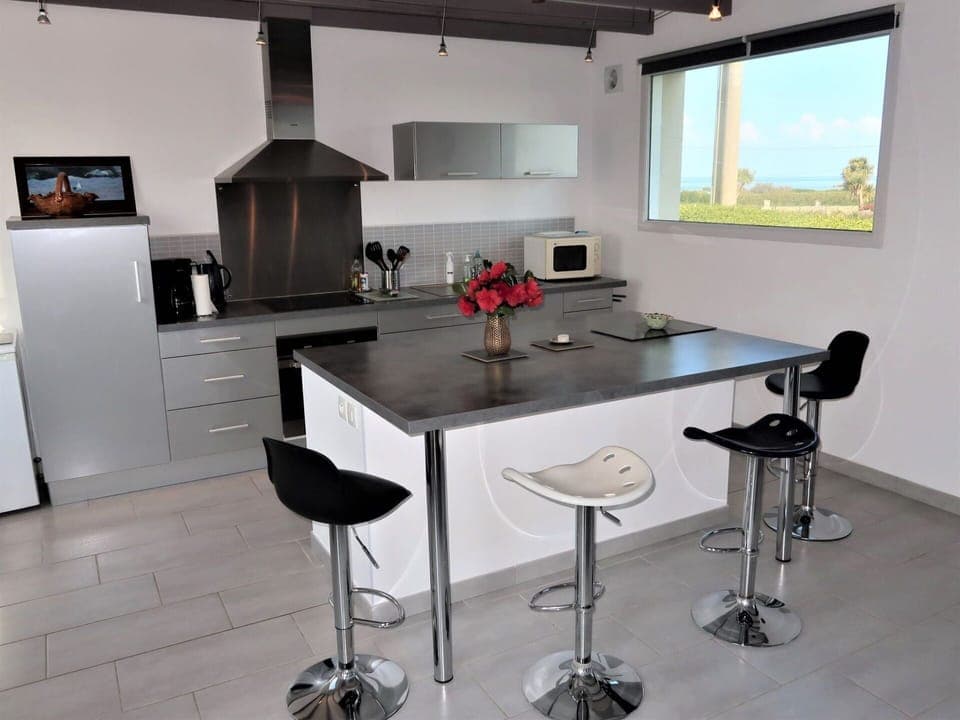 Table, Property, Furniture, Cabinetry, Lighting, Interior Design, Countertop, Flooring, Wood, Architecture