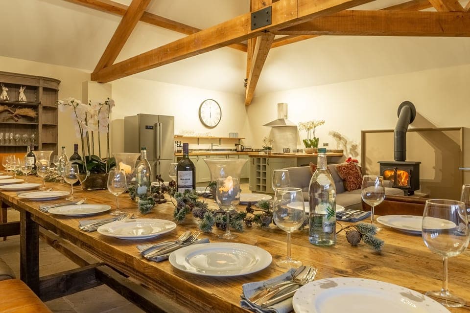 Ground floor:  Dining table with view to kitchen and sitting room