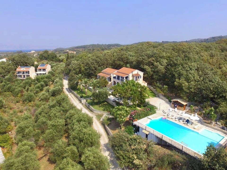 Welcome to our tranquil, hillside, studio and apartment village