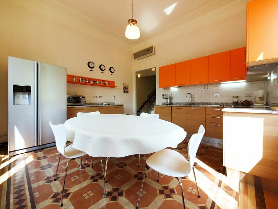 Furniture, Table, Cabinetry, Chair, Lighting, Interior Design, Wood, Flooring, Kitchen, Floor