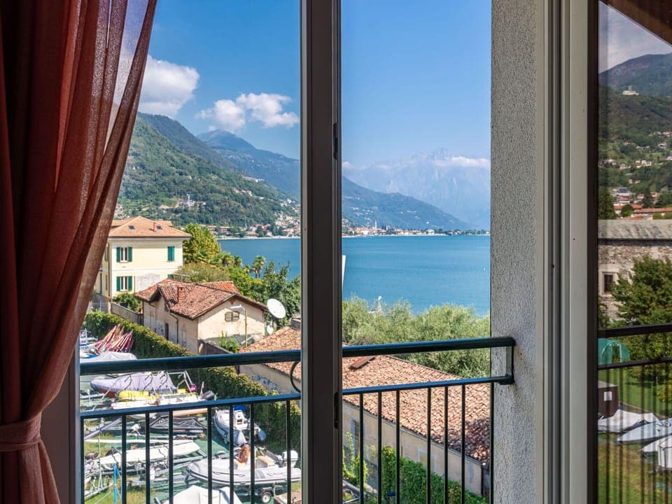 Water, Sky, Daytime, Building, Property, Cloud, Mountain, Window, Azure, Nature