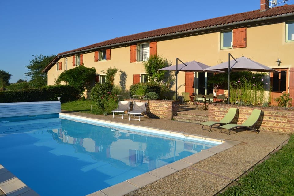 Swimming pool and back of house