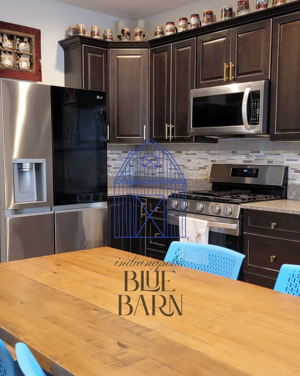 Kitchen with Stainless steel appliances.