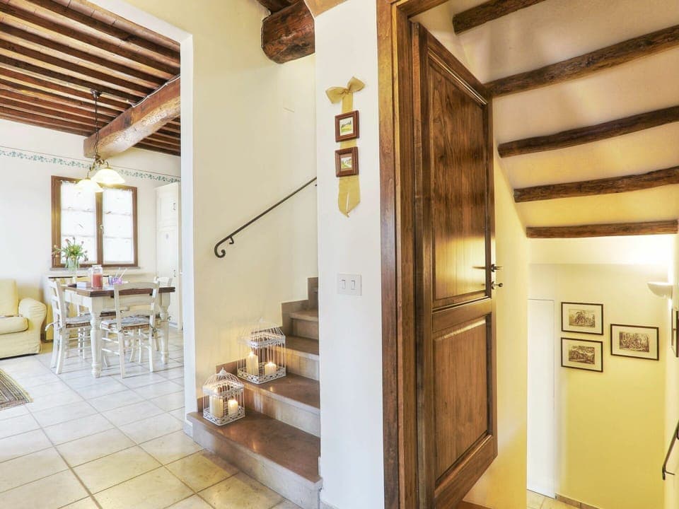 Property, Plant, Picture Frame, Building, Wood, Interior Design, Lighting, Architecture, Ceiling Fan, Hall