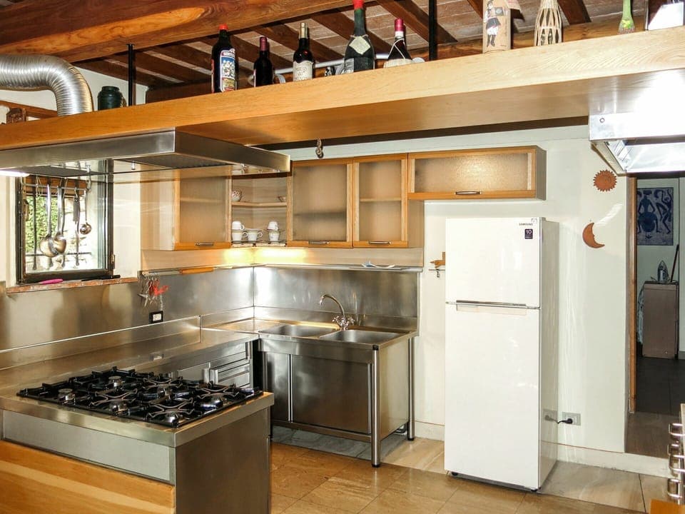 Countertop, Cabinetry, Room, Kitchen, Property, Furniture, Interior Design, Lighting, Building, Ceiling