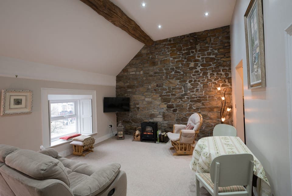 Bright comfortable Living room overlooking the town centre 