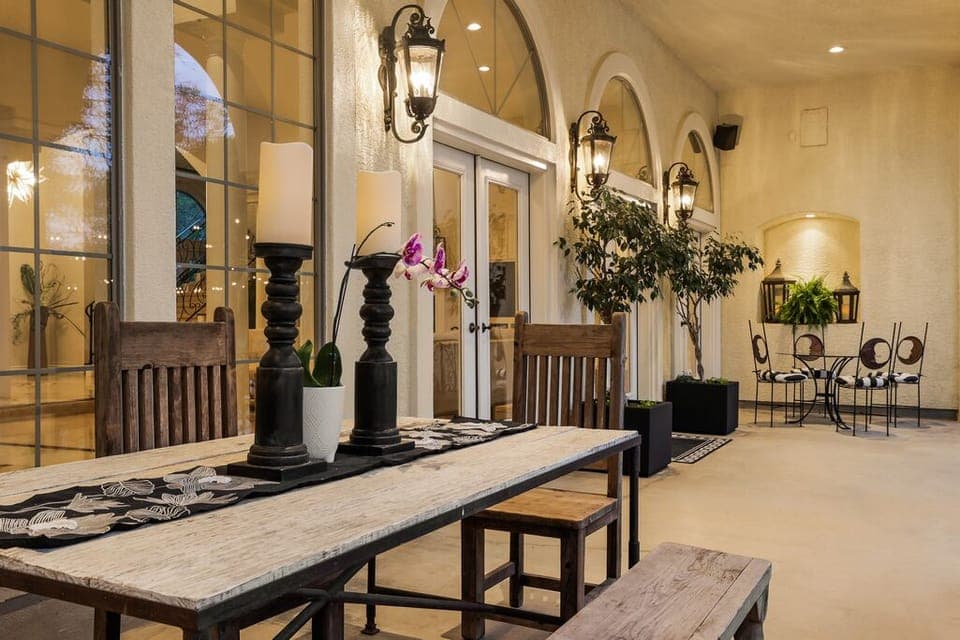 Back veranda with multiple seating.