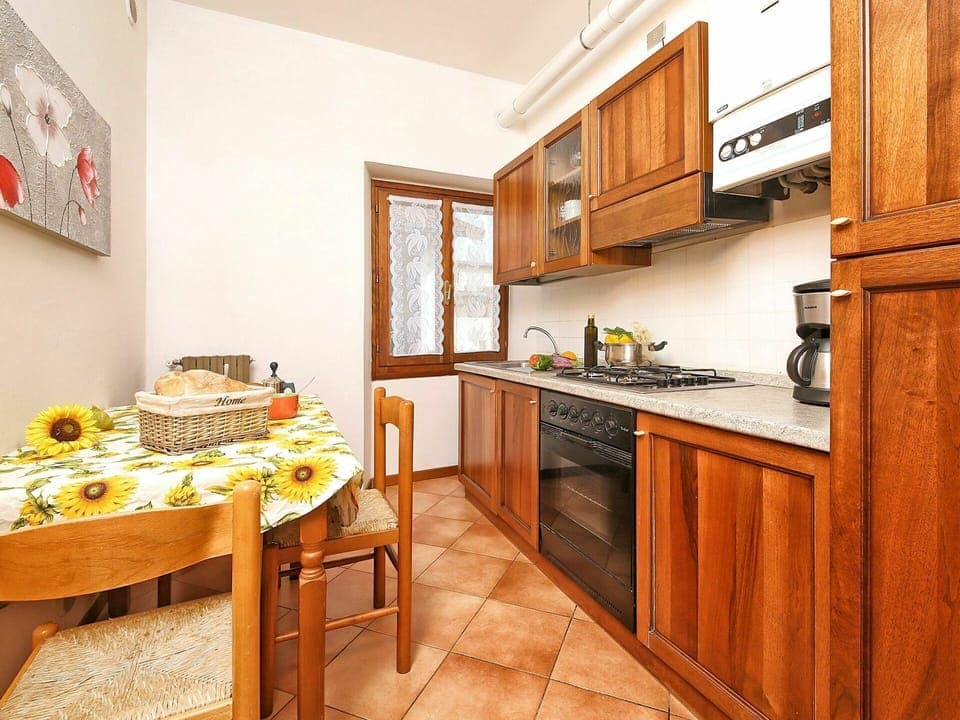 Cabinetry, Furniture, Property, Countertop, Table, Interior Design, Orange, Kitchen Appliance, Wood, Kitchen