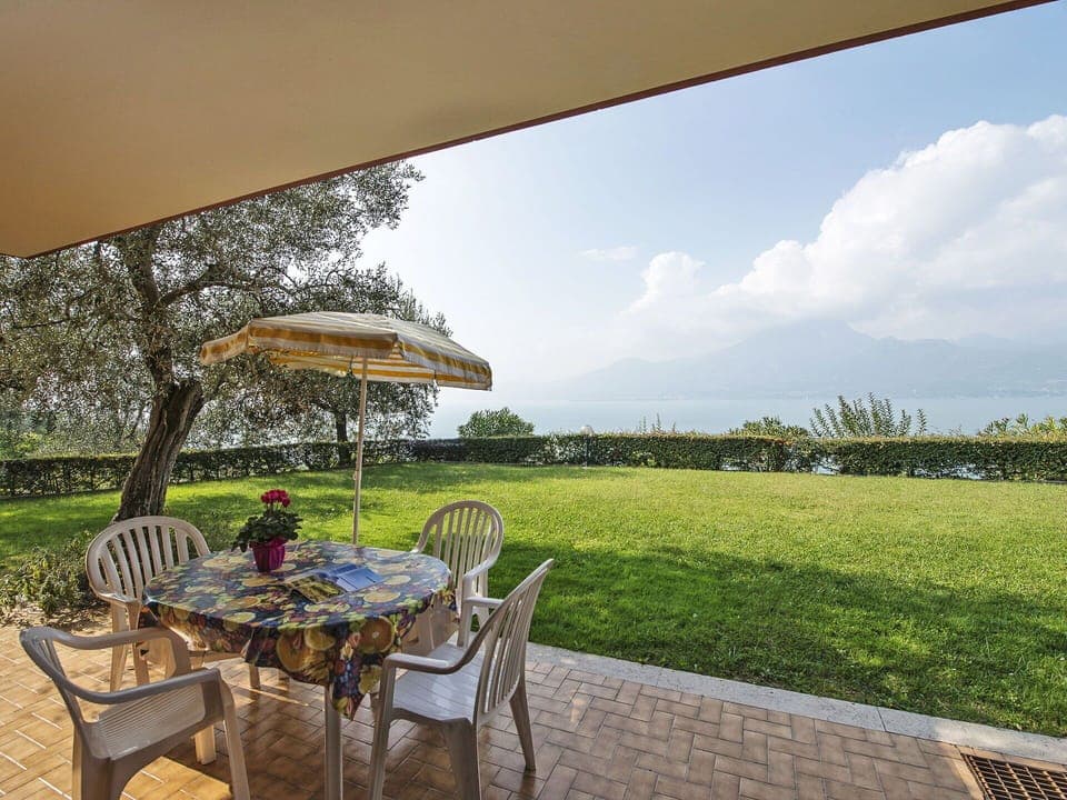 Plant, Sky, Table, Cloud, Property, Furniture, Chair, Umbrella, Natural Landscape, Tree