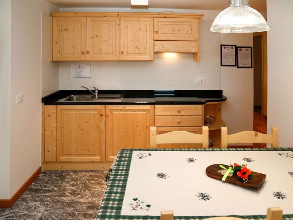 Cabinetry, Furniture, Countertop, Property, Kitchen Sink, Wood, Drawer, Kitchen Stove, Kitchen, Lighting