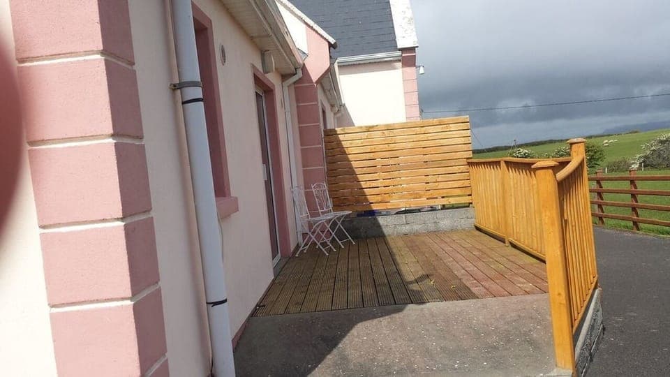 Patio Area with wonderful views - House and decking was painted since this pic!