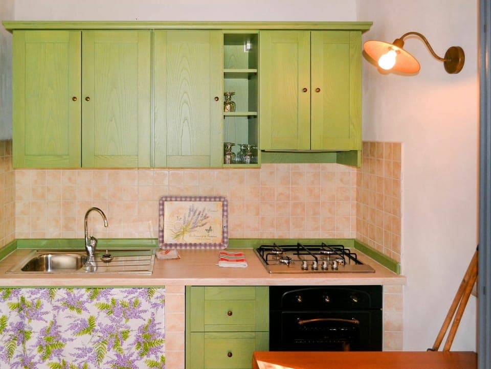 Countertop, Cabinetry, Room, Kitchen, Tile, Furniture, Property, Green, Kitchen Stove, Sink