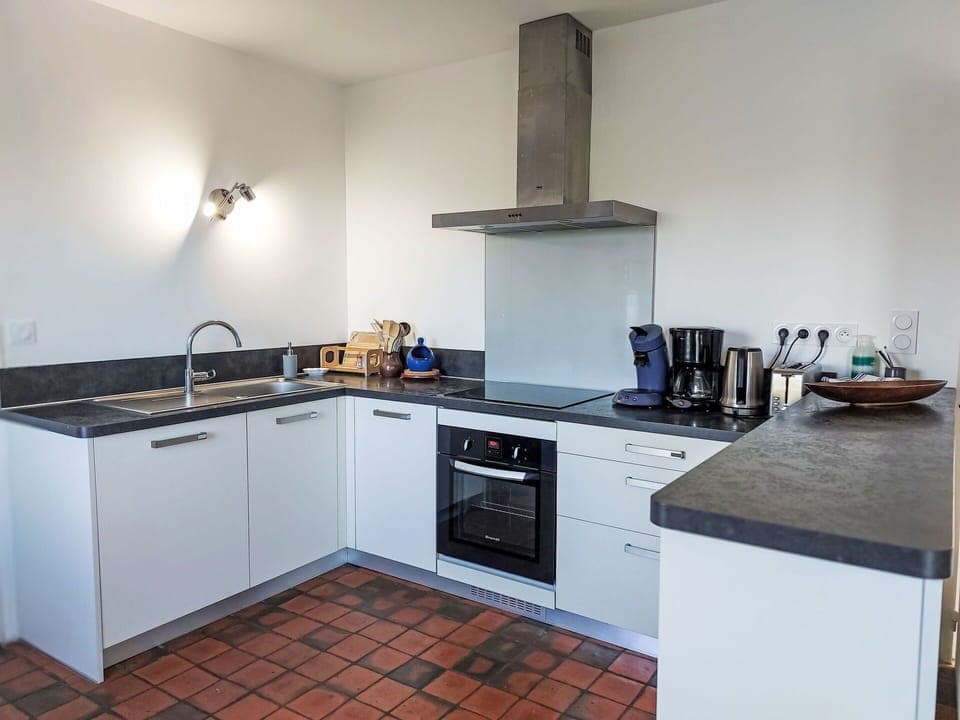 Kitchen, Kitchen Appliance, Countertop, Major Appliance, Kitchen Stove, Flooring, Kitchen Sink, Stove, Gas Stove, Cabinetry