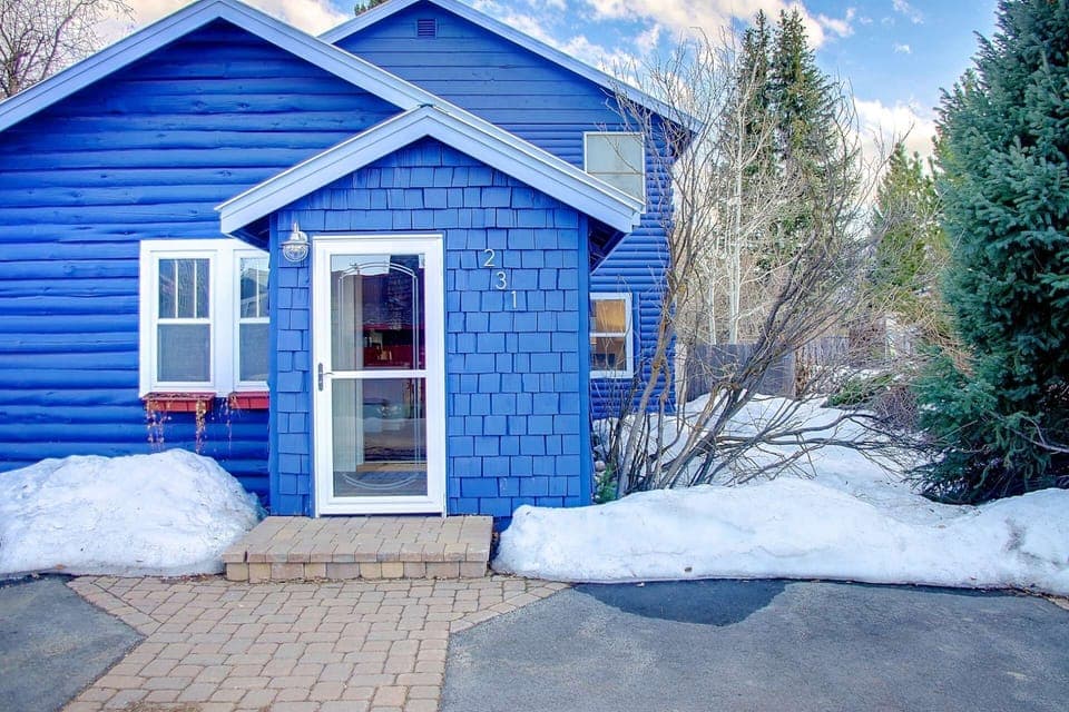 You Can't Miss This Blue Home!