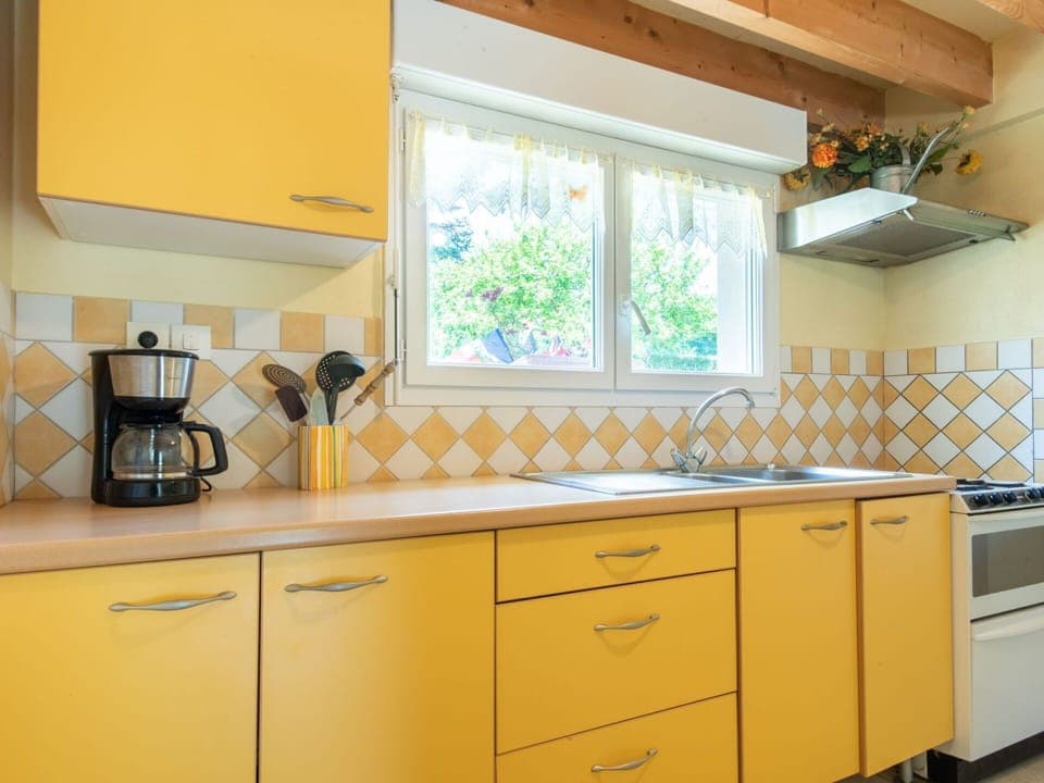 Cabinetry, Countertop, Property, Kitchen Sink, Kitchen Appliance, Kitchen, Drawer, Lighting, Interior Design, Home Appliance