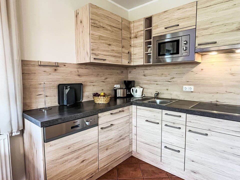 Cabinetry, Furniture, Flooring, Drawer, Countertop, Kitchen, Floor, Kitchen Appliance, Wood Flooring, Cupboard