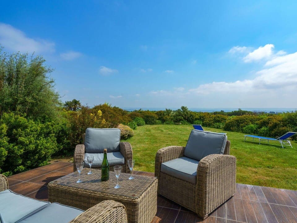 Cloud, Sky, Furniture, Table, Plant, Property, Chair, Outdoor Furniture, Natural Landscape