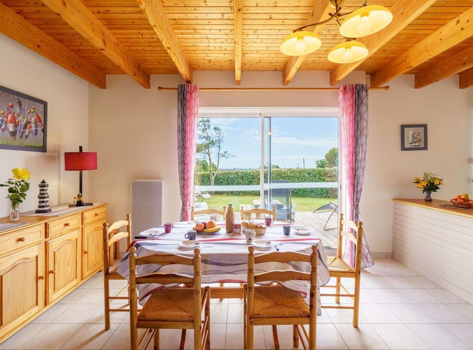 Furniture, Property, Table, Cabinetry, Chair, Lighting, Interior Design, Wood, Houseplant, Yellow