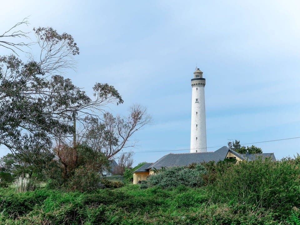 Sky, Cloud, Plant, Tower, Building, Tree, Beacon, Coastal And Oceanic Landforms, Biome