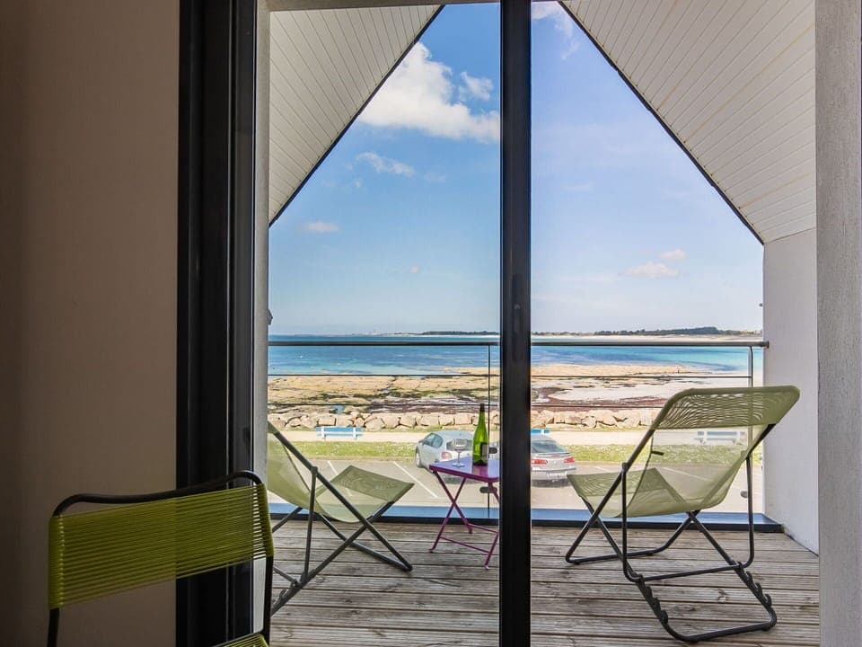 Sky, Building, Furniture, Water, Property, Cloud, Window, Table, Chair, Azure