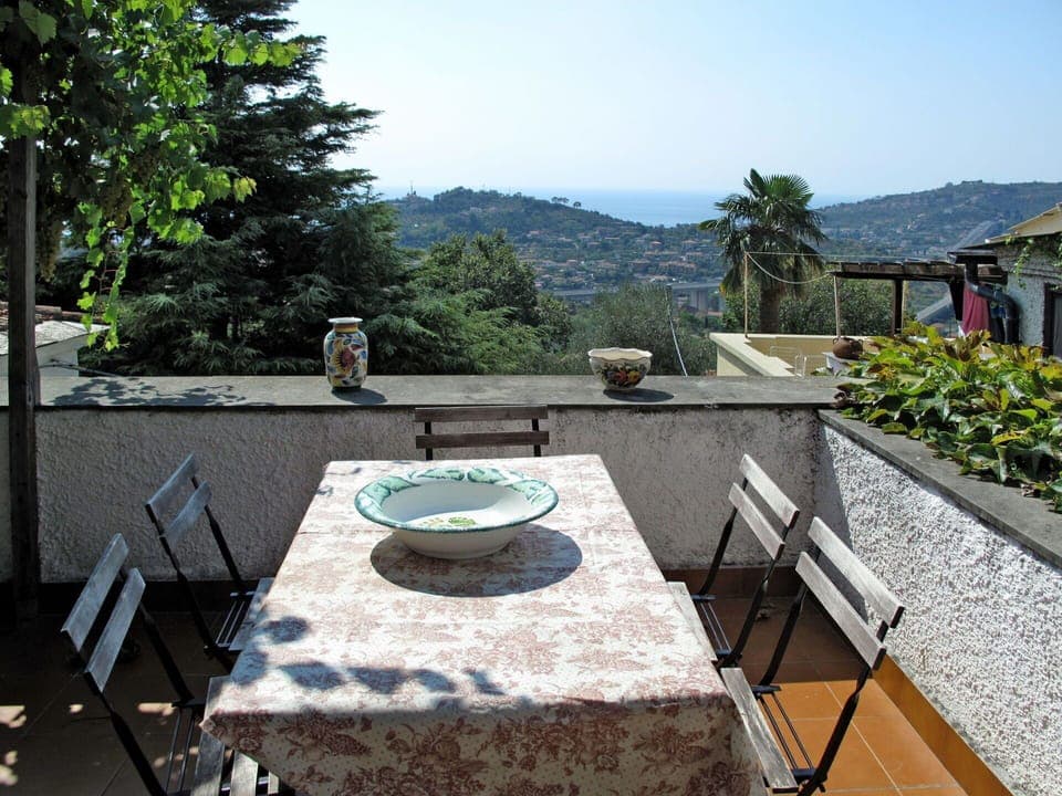 Sky, Property, Furniture, Building, Plant, Table, Outdoor Furniture, Tree, Chair, House