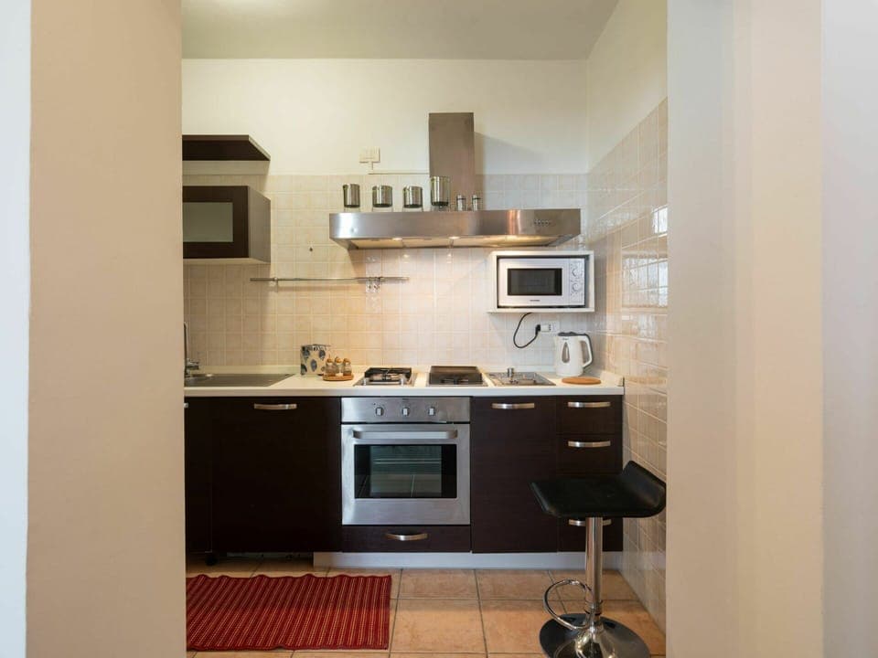 Cabinetry, Countertop, Building, Kitchen Appliance, Tap, Home Appliance, Interior Design, Wood, Kitchen Stove, Kitchen