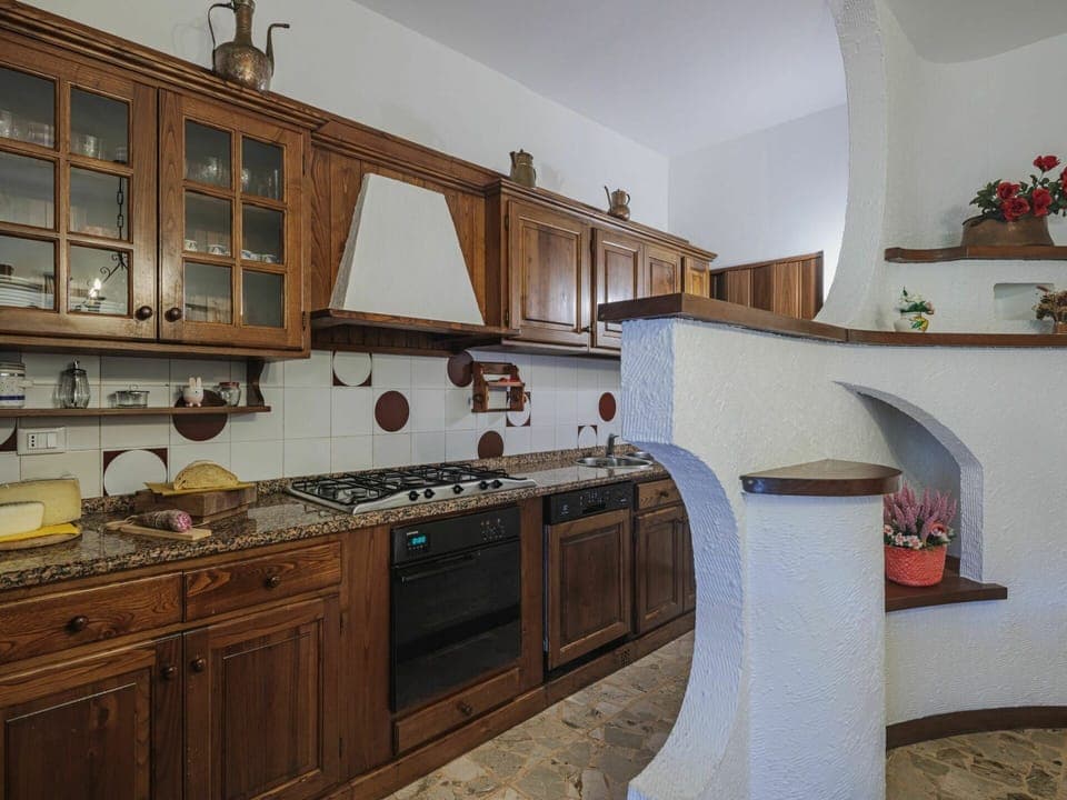 Cabinetry, Countertop, Property, Sink, Wood, Kitchen Stove, Tap, Kitchen, Building, Interior Design