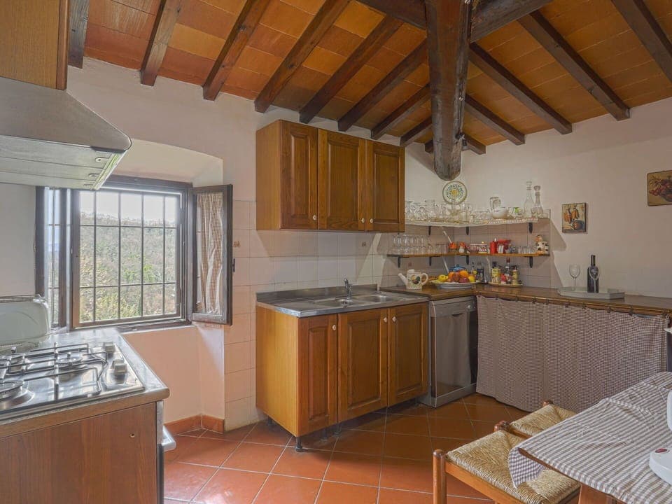 Countertop, Cabinetry, Property, Furniture, Window, Building, Kitchen, Kitchen Stove, Sink, Kitchen Appliance