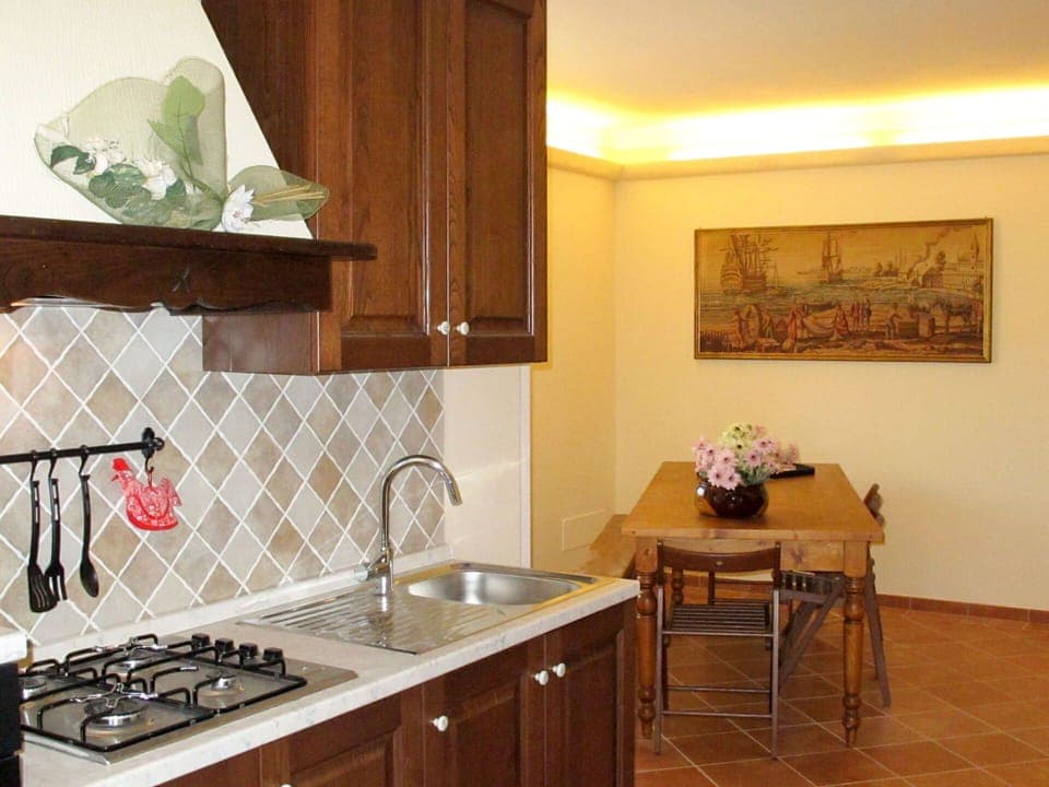 Room, Countertop, Property, Kitchen, Furniture, Interior Design, Building, Tile, Cabinetry, Floor