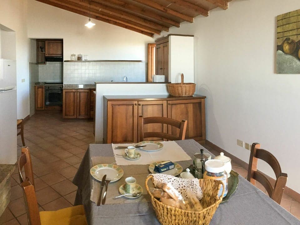 Table, Furniture, Property, Cabinetry, Chair, Wood, Interior Design, Tableware, Living Room, Floor