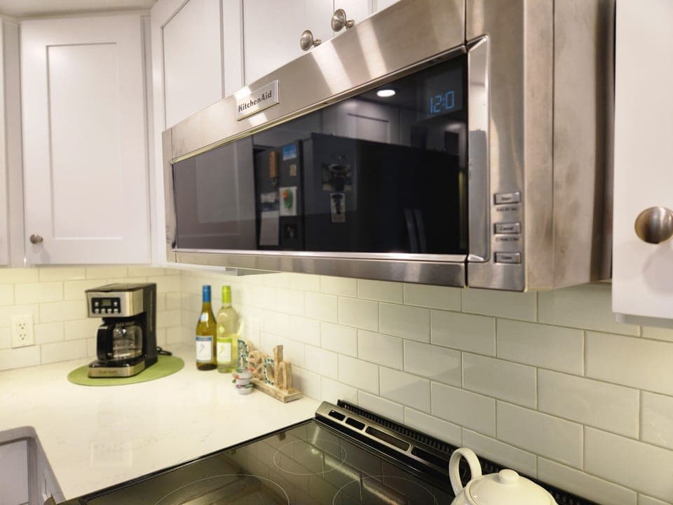 New 1100 watt slimline microwave and Glasstop Convection Oven/Range.