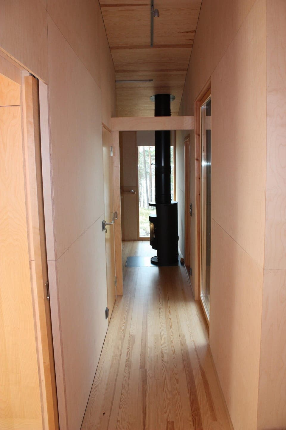 Hallway to master bedroom with fireplace