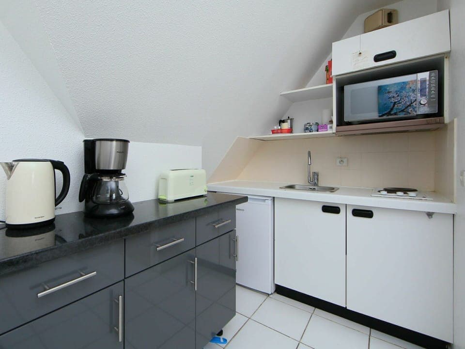 Cabinetry, Tap, Countertop, Building, Furniture, Kitchen, Drawer, Kitchen Appliance, Kitchen Stove, Interior Design