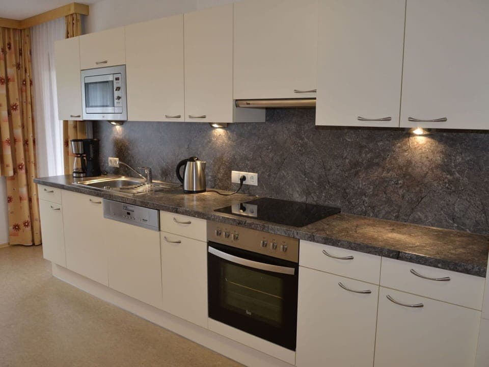 Cabinetry, Tap, Countertop, Kitchen Sink, Property, Sink, Kitchen Stove, Kitchen, Plumbing Fixture, Wood