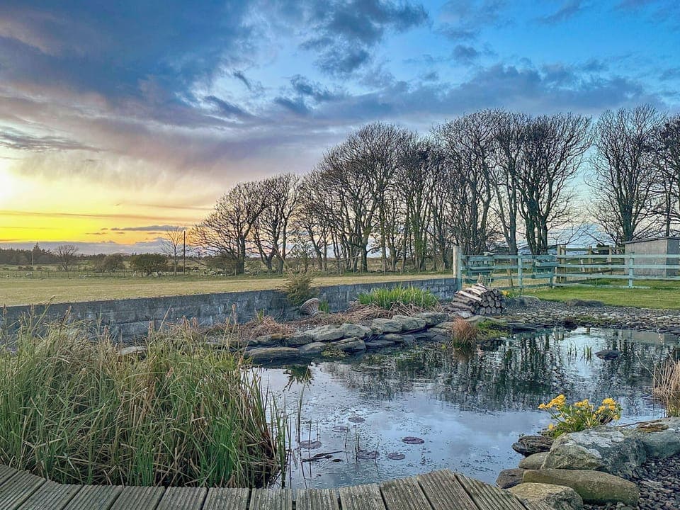 Garden view | Rhunahaorine Cottage, Tayinloan, near Tarbert