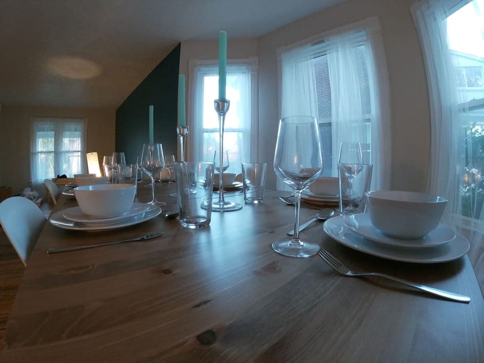 Dining room table seats 10 maximum at a time.