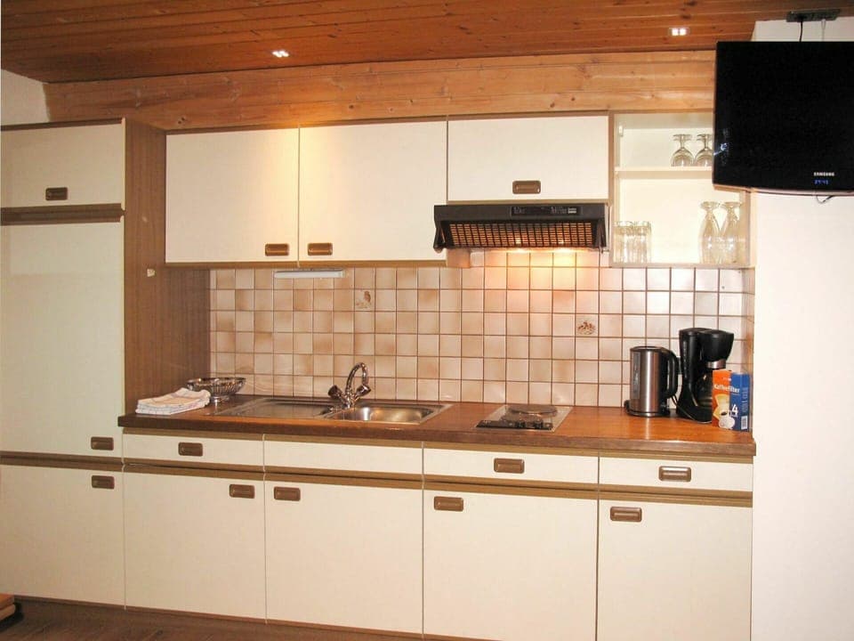 Cabinetry, Countertop, Property, Kitchen Sink, Sink, Kitchen Stove, Gas Stove, Kitchen Appliance, Tap, Kitchen